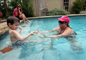 Alex Meets the Swim Guru. Photo: Helen L. Montoya, San Antonio Express-News